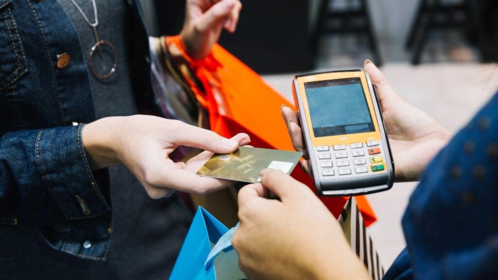 Web3 Meets Retail with a Crypto Card, smartphone wallet, and seamless digital checkout in a modern retail environment